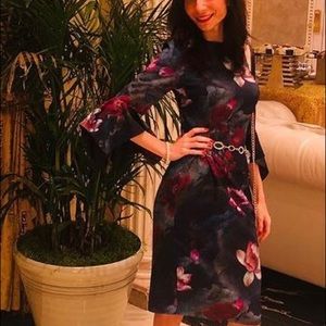 Dress is up to knees. Has best elegant look